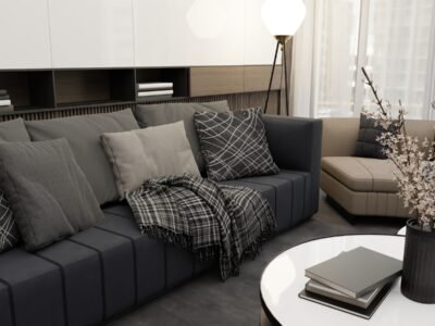 a living room filled with furniture and a white table